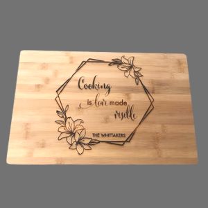 Cooking is Love Made Visible Cutting Board